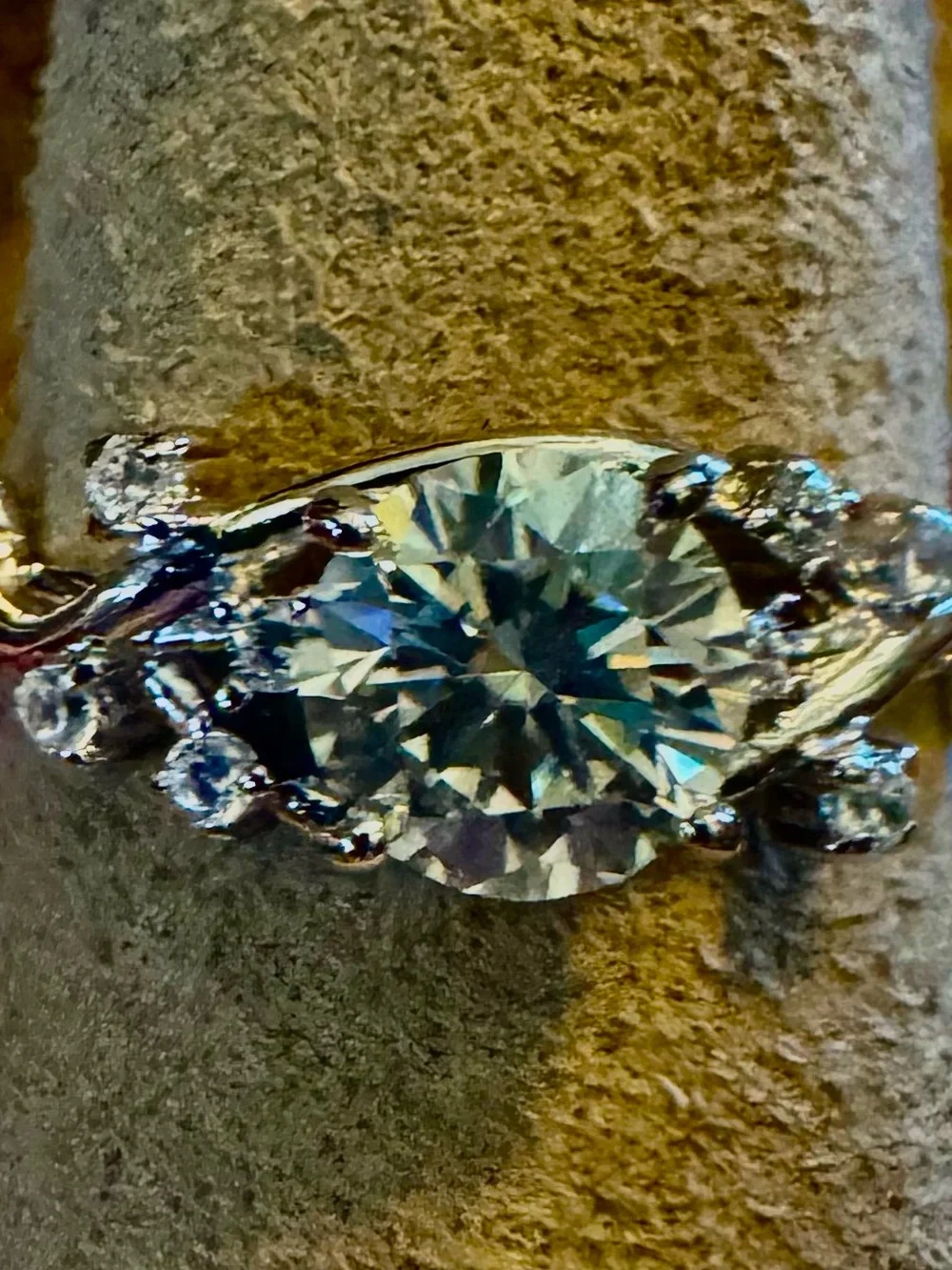 Silver Floral Vine Ring with 1.0 ct Moissanite center stone.